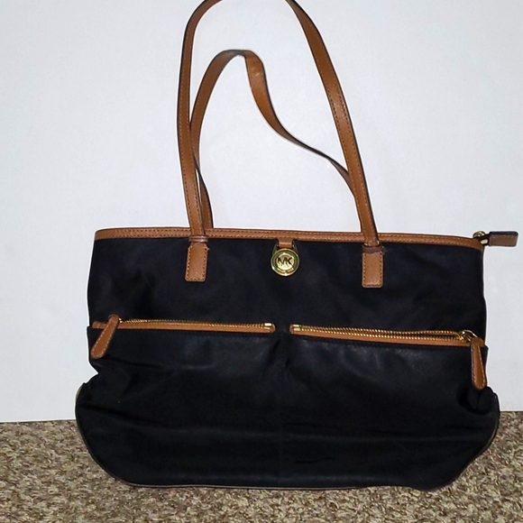 Michael Kors Handbags - LAST CALL Michael Kors large shoulder bag lots pockets good condition donate soo